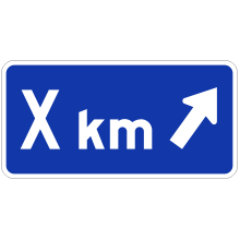 Panonceau de distance et de direction à droite (flèche oblique)