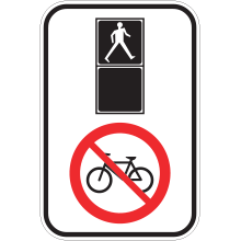 Crossing Prohibited for Cyclists at a Pedestrian Signal sign
