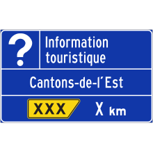 Présignalisation de sortie vers un bureau d’information touristique (Cantons-de-l'Est)