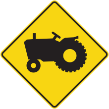Passage ou sortie de véhicules agricoles 