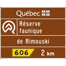 Réserve faunique (présignalisation de sortie « 2 km »)