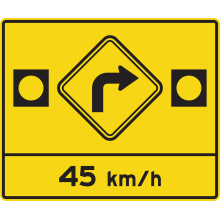  Virage avec feux clignotants